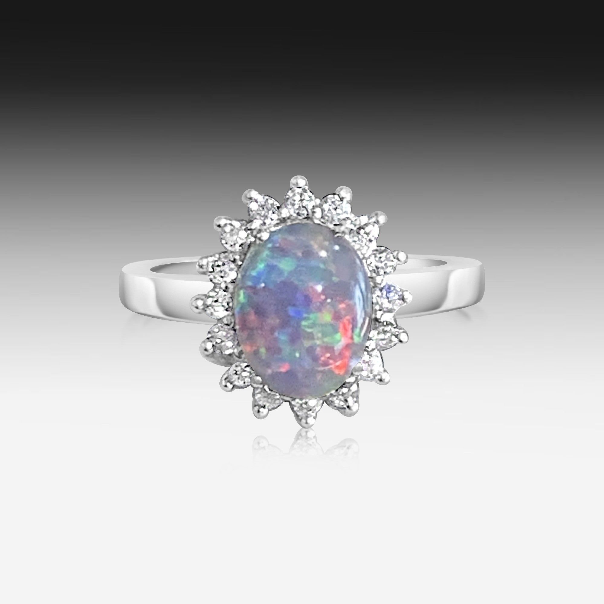 Sterling Silver Opal triplet 10x8mm cluster ring with cubic zirconias