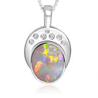 One 18kt Black Opal Oval 5.8ct and 7 Diamonds pendant enhancer