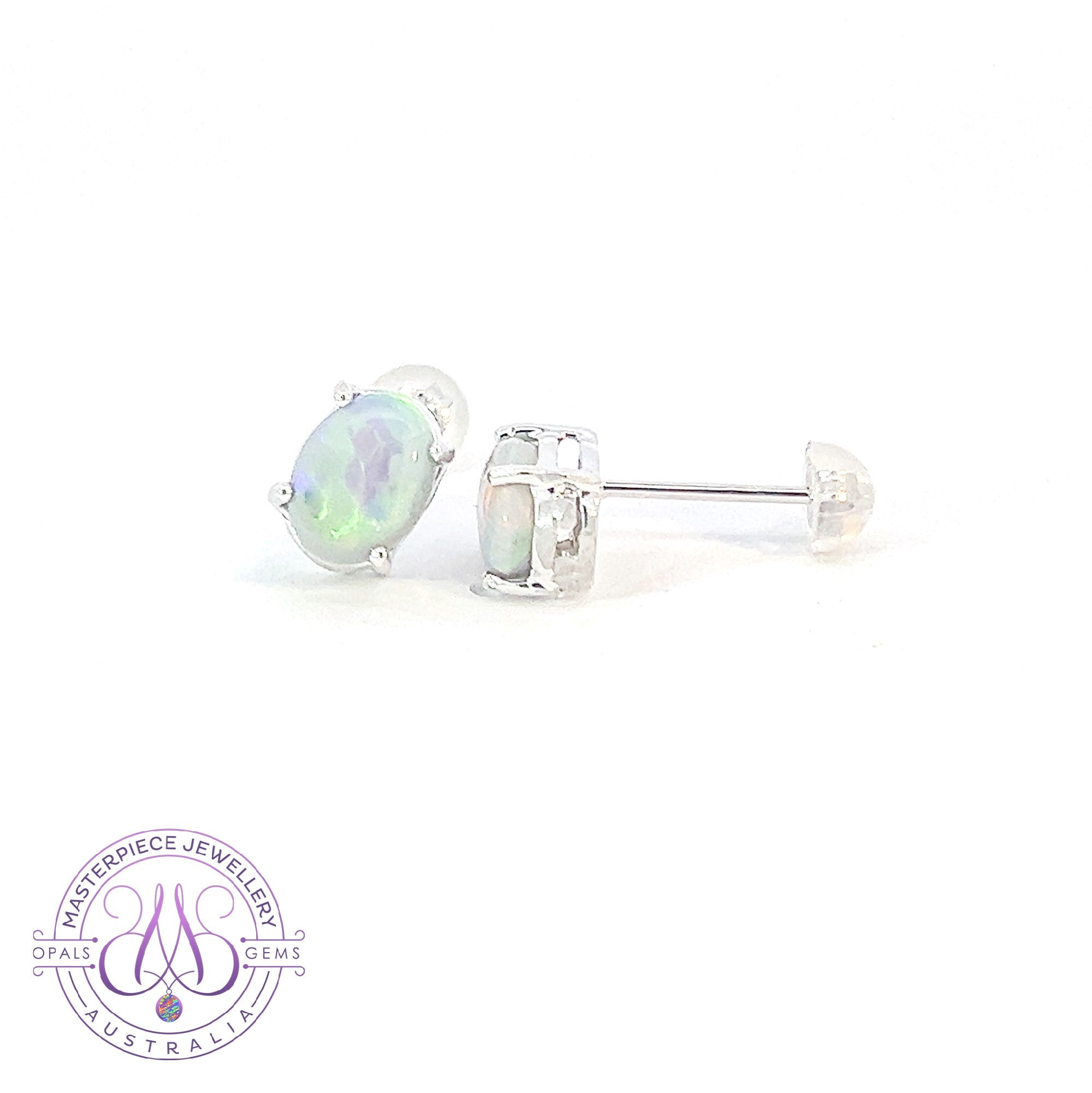 18kt White Gold Black Opal studs 1.2ct claw set