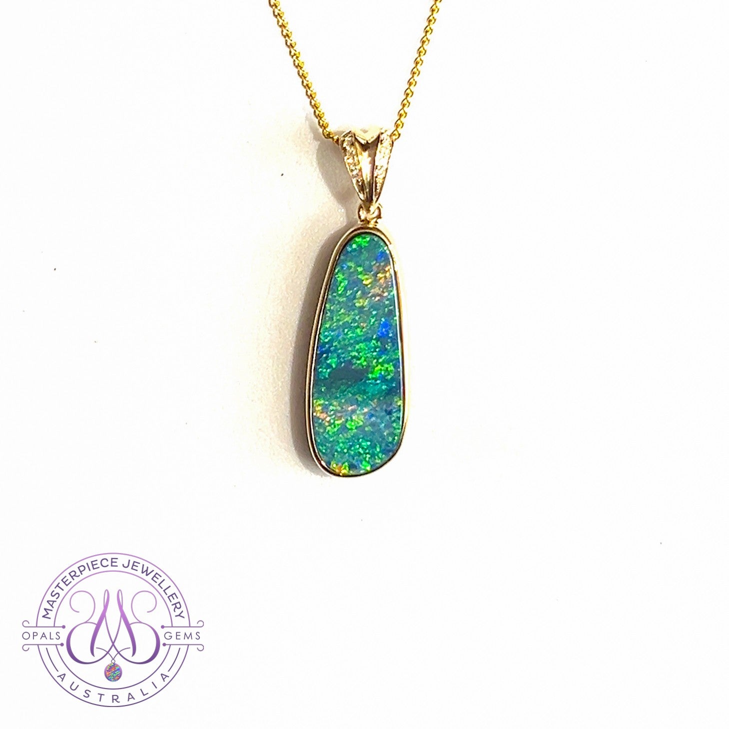 14kt Yellow Gold Long Opal 6.65ct doublet with diamonds pendant