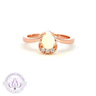 Rose Gold plated silver ring with one 7x5mm White Opal and cubic zirconia