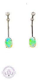 14kt White Gold long bar drop style Crystal Opal earrings