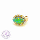 18kt Yellow Gold horizontal cluster Boulder Opal ring