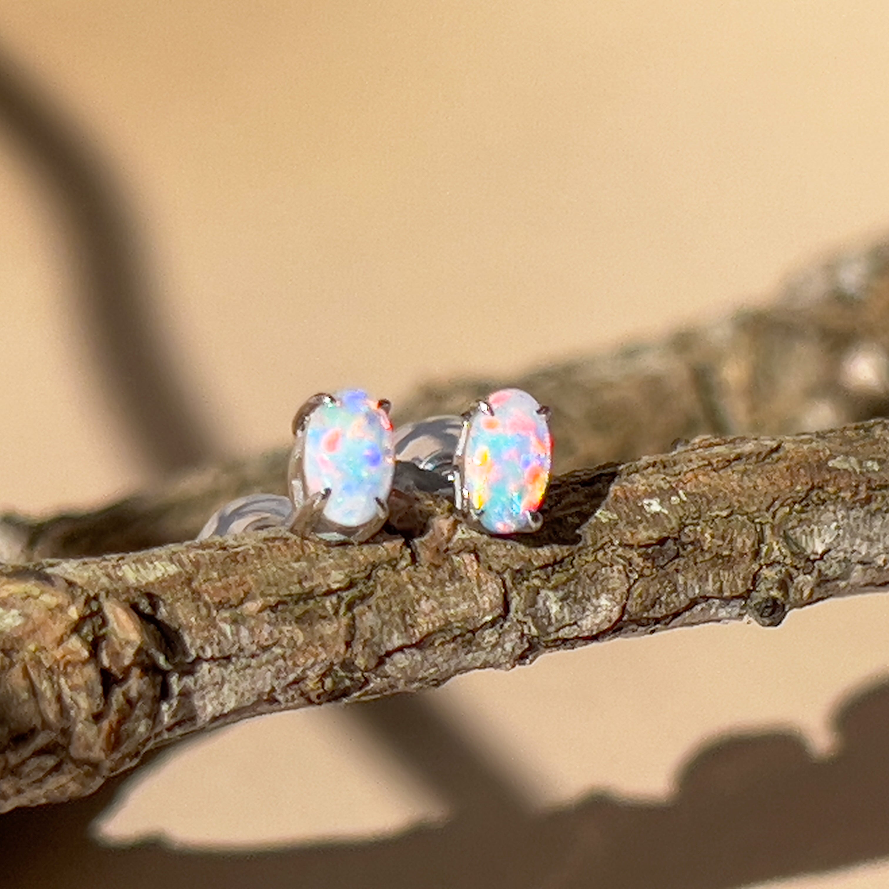 9Kt White Gold Crystal Opal Earrings - 5x3mm 4-Claw Studs, Elegant Opal Jewelry, Perfect Gift for Her, Luxury Gold Stud Earrings - Masterpiece Jewellery Opal & Gems Sydney Australia | Online Shop