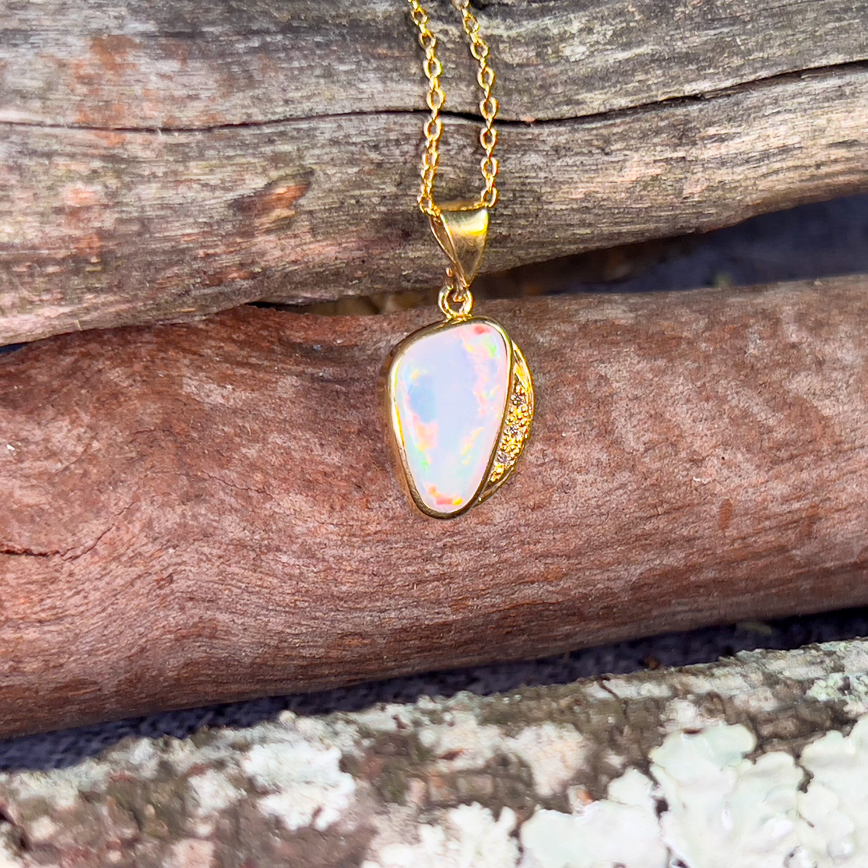 18kt Yellow Gold White Opal red fire and diamond pendant - Masterpiece Jewellery Opal & Gems Sydney Australia | Online Shop