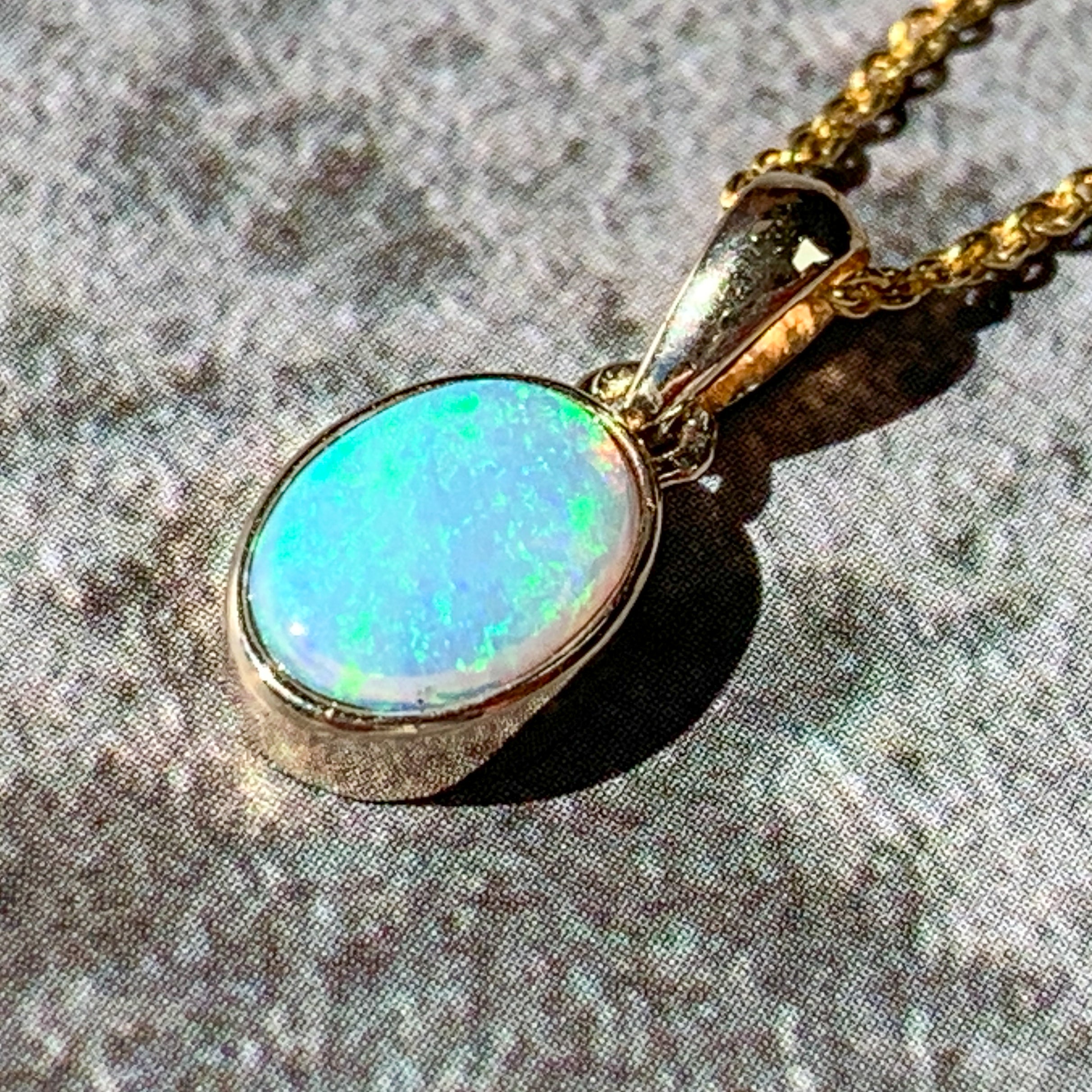 9kt Yellow Gold bezel set 8x6mm Light Opal pendant - Masterpiece Jewellery Opal & Gems Sydney Australia | Online Shop