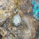 9kt Yellow Gold 7x5mm White Opal and diamond cluster pendant - Masterpiece Jewellery Opal & Gems Sydney Australia | Online Shop