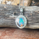 18kt White gold halo Black Opal 1.92ct Red flash pendant with diamonds pendant - Masterpiece Jewellery Opal & Gems Sydney Australia | Online Shop