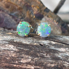 14kt Yellow Gold claw set Black Opal studs 1.59ct - Masterpiece Jewellery Opal & Gems Sydney Australia | Online Shop